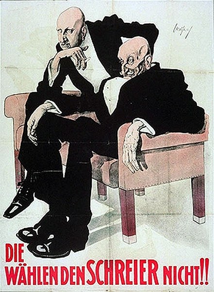 Deutsches Propagandaplakat der NSDAP mit zwei Männern auf einem Sofa.