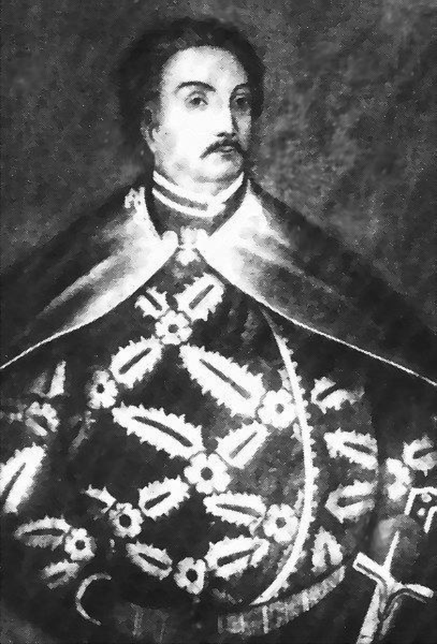 Schwarzes und weißes Foto von Papst Johannes Paul II. in Priesterroben, der eine schwarze Robe mit weißem Kragen und Manschetten trägt und die Hände verschränkt.