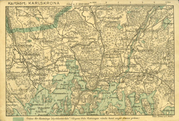 Ein altes Stadtplan von Karlsruhe, Deutschland, das detaillierte Straßen, Gebäude und Sehenswürdigkeiten zeigt, mit Text oben und unten.