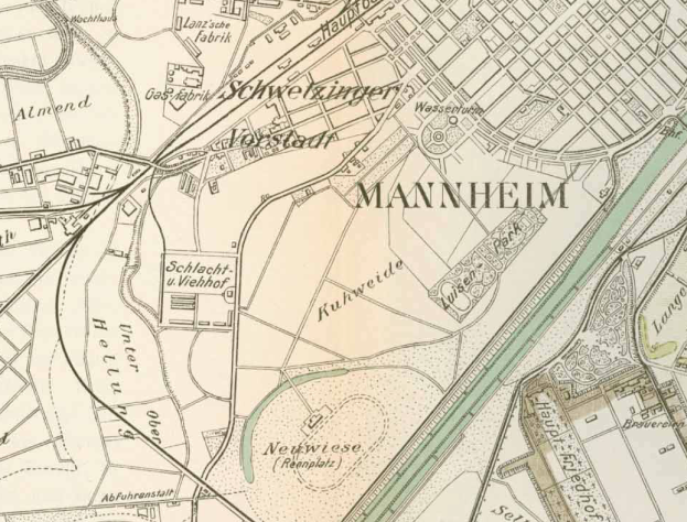 Ein detaillierter alter Stadtplan von Mannheim, Deutschland, mit Straßen, Gebäuden und Sehenswürdigkeiten in Blau-, Grün- und Gelbtönen gekennzeichnet.