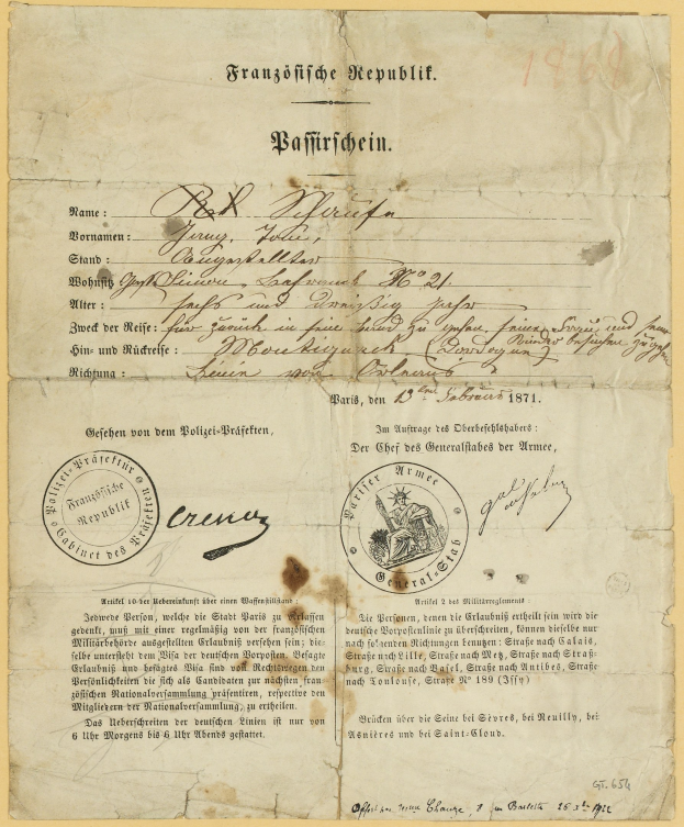 Altes deutsches Regierungsdokument mit einem kreisrunden, schwarz umrandeten Stempel auf vergilbtem Papier, geschrieben in schwarzer Tinte.